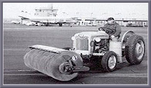 M-B Man on tractor with brush